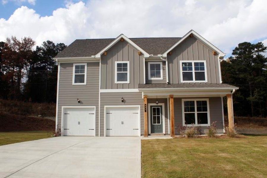 Front exterior of a new home in , Commerce, GA, highlighting curb appeal (Image 2).