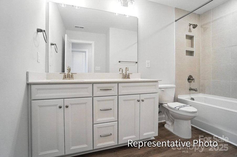 Furnished interior view inside a new home in Heritage - 55+ Community, Wesley Chapel (Image 9).