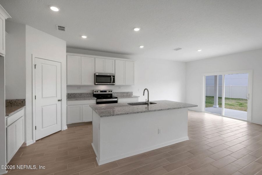 Furnished interior view inside a new home in Wilford Oaks, Orange Park (Image 10).