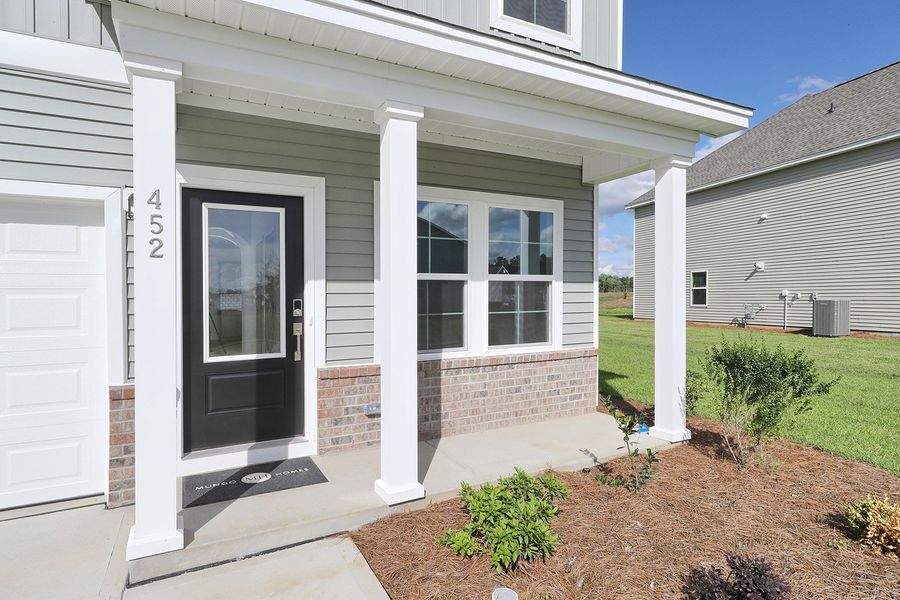 Exterior details and patio area of a home in Garden Grove, Conway (Image 3).