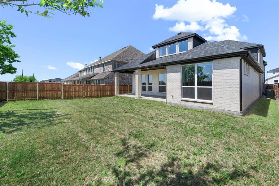Exterior details and patio area of a home in North Sky, Celina (Image 24). Exterior details and patio area of a home in North Sky, Celina (Image 24).