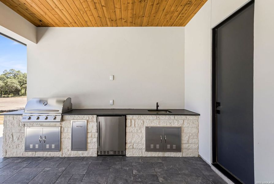 Exterior details and patio area of a home in , Boerne (Image 28).