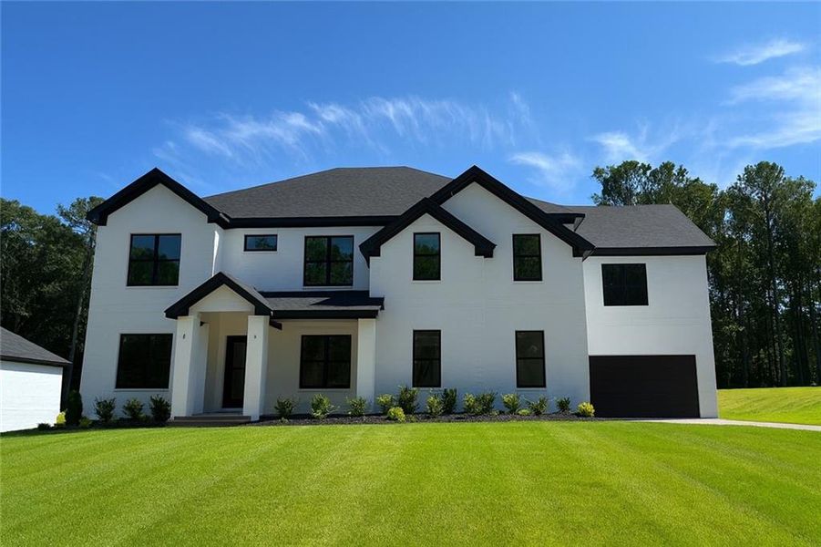 Front exterior of a new home in , Grayson, GA, highlighting curb appeal (Image 1).