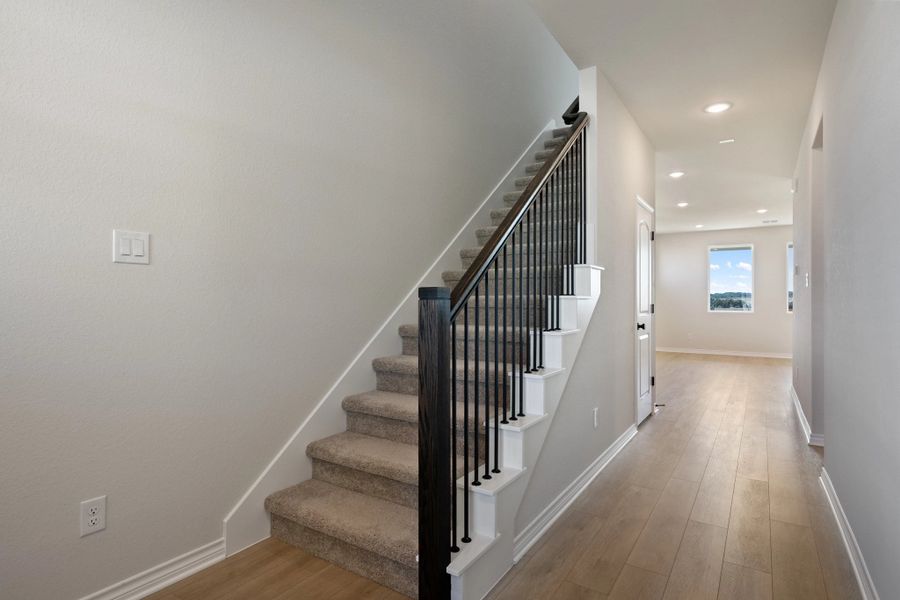 Spacious, unfurnished interior of a new home in The Homestead at Lariat, Liberty Hill (Image 23).