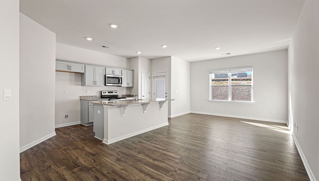 Furnished interior view inside a new home in Tanglewood Townes, Greenville (Image 5).