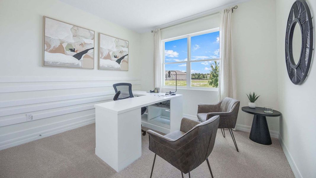 Representative furnished interior of a home built from the DELRAY by D.R. Horton in Lakes of Mount Dora, Mount Dora (Image 25).