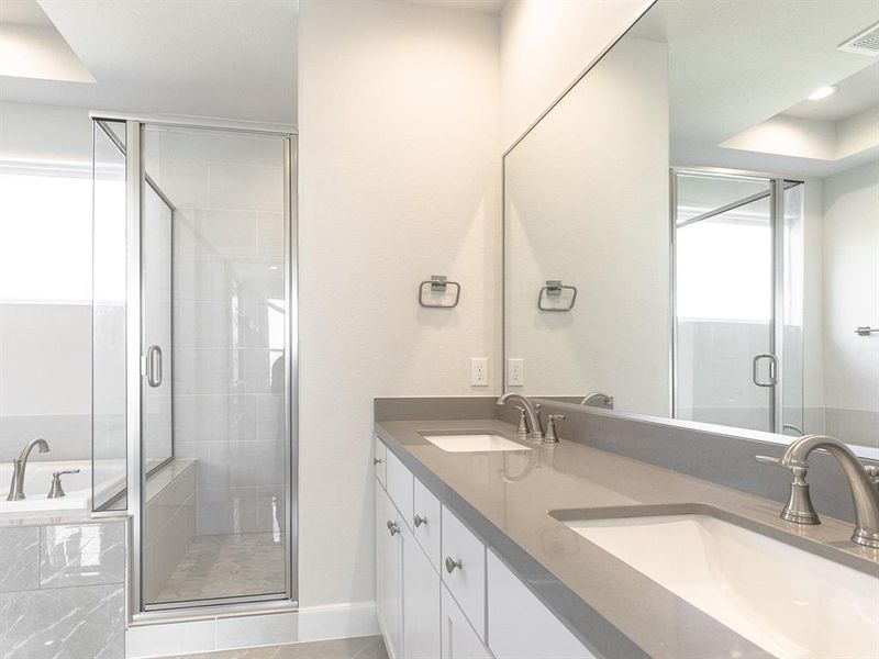 2nd Floor - Primary Bathroom with Dual Vanity Sinks.