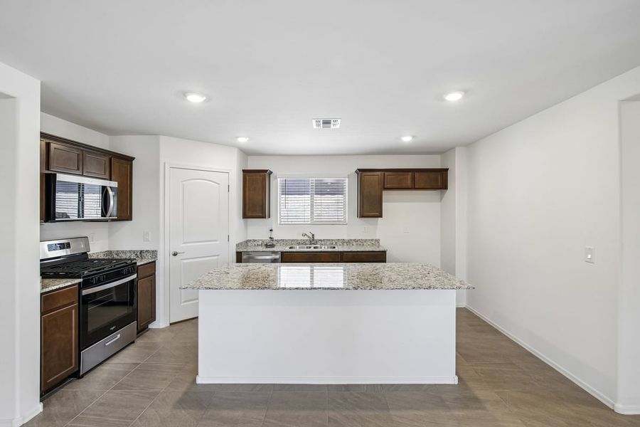 Furnished interior view inside a new home in Mandarina Reserve, Marana (Image 5).