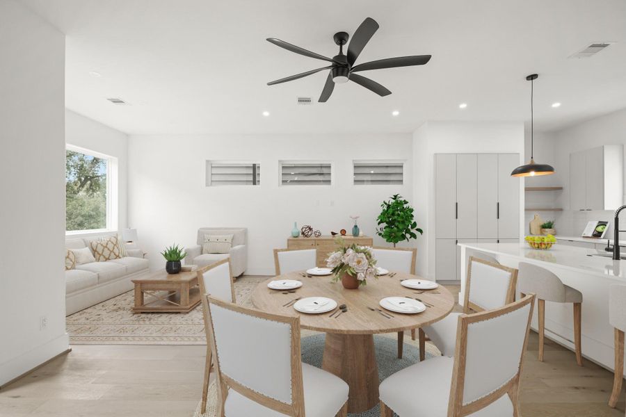 The spacious second level provides a flexible space that suits a variety of needs and with two large fixed windows, three transom windows, wide planked hardwood floors, 10 inch baseboards, ceiling fan with light and recessed lighting throughout, there is plenty of light flowing throughout the entire second floor. This photo has been virtually staged.