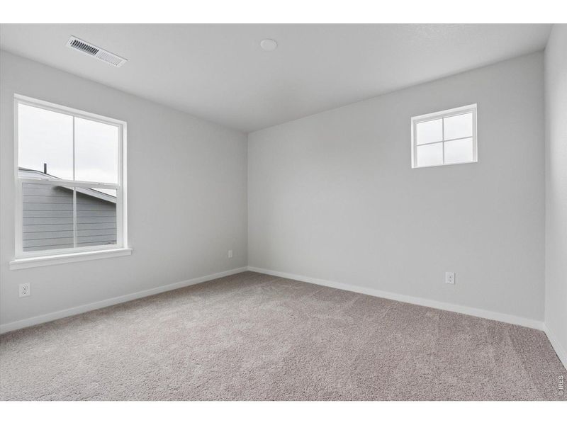 Spacious, unfurnished interior of a new home in Prairie Song, Windsor (Image 24).