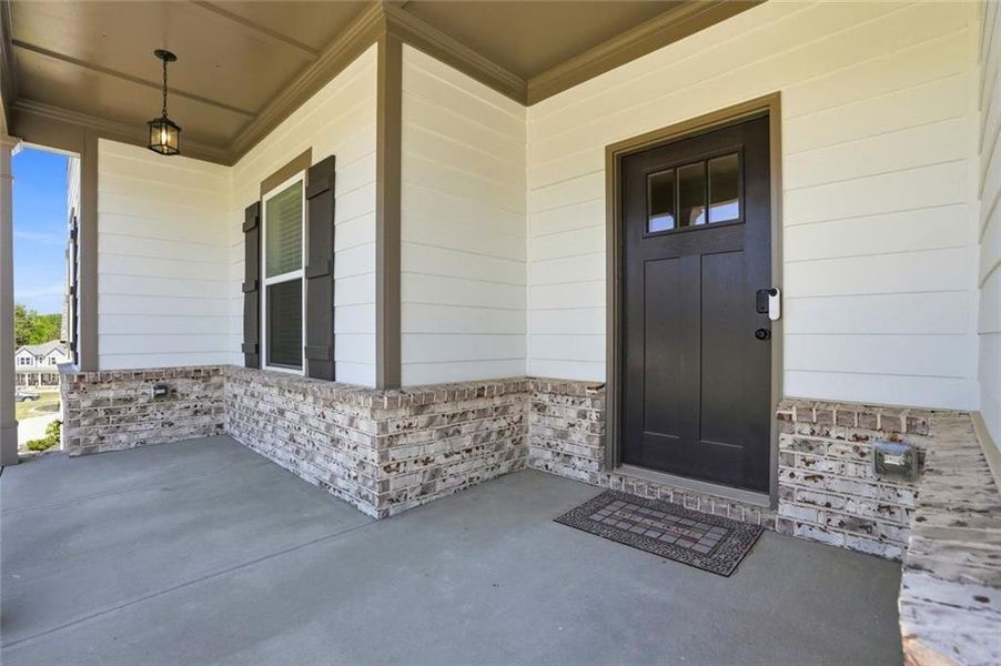 Exterior details and patio area of a home in Calgary Downs, Winder (Image 26).