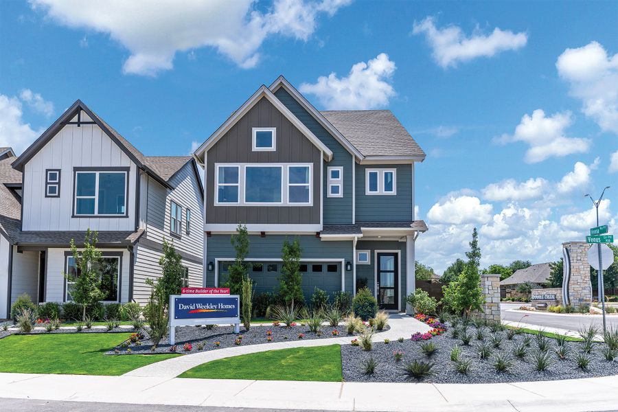 Representative exterior photo of a completed home built from the The Baines by David Weekley Homes in Double Creek Crossing – Craftsman Series, Round Rock, TX (Image 1). Representative exterior photo of a completed home built from the The Baines by David Weekley Homes in Double Creek Crossing – Craftsman Series, Round Rock, TX (Image 1).