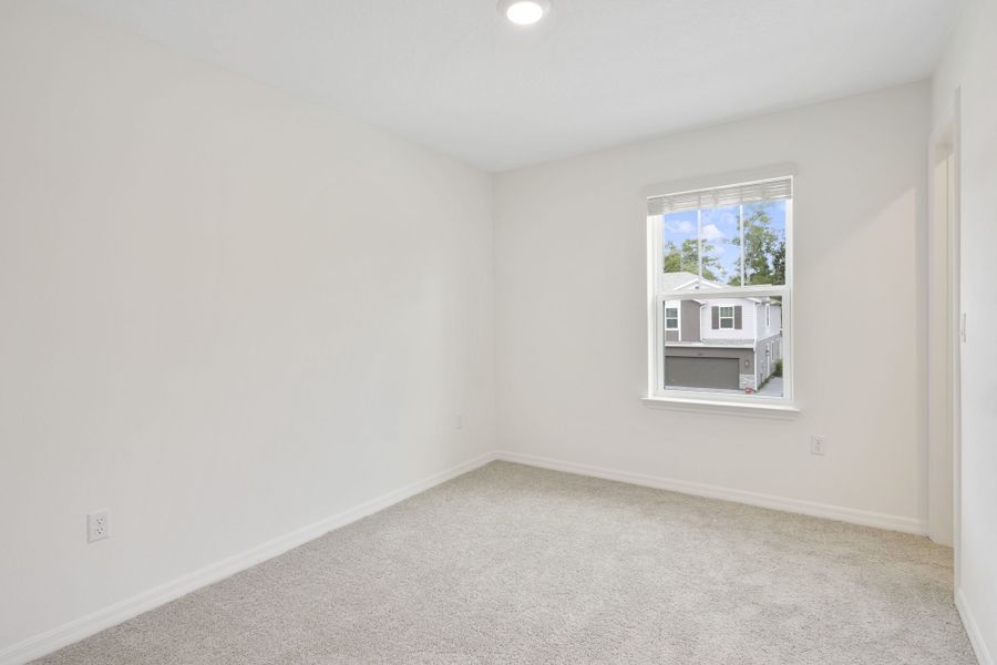 Spacious, unfurnished interior of a new home in Towns at Riverwalk, Sanford (Image 29).