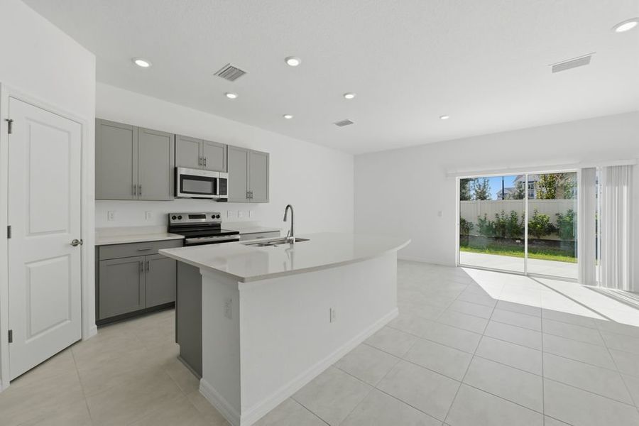 Furnished interior view inside a new home in Vinterra Townhomes, Nokomis (Image 5).