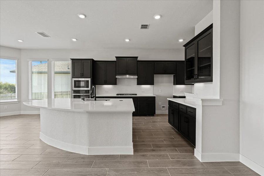 Furnished interior view inside a new home in Village at Three Oaks, Seguin (Image 10).