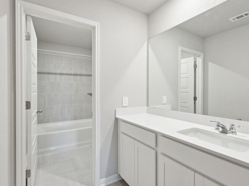 Guest bathroom in the San Jacinto floorplan at a Meritage Homes community.