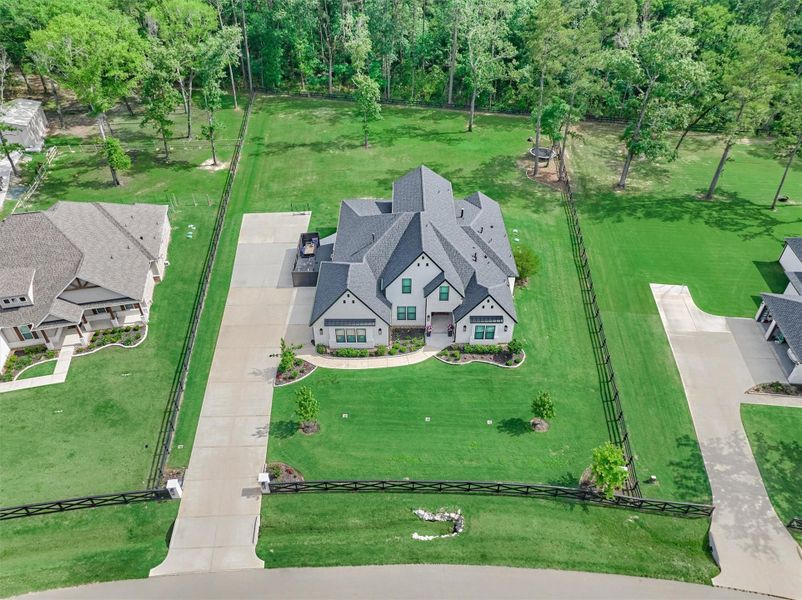 Front exterior of a new home in , Montgomery, TX, highlighting curb appeal (Image 23).