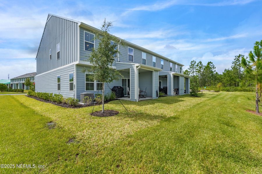 Exterior details and patio area of a home in Shearwater Townhomes, St. Augustine (Image 21).