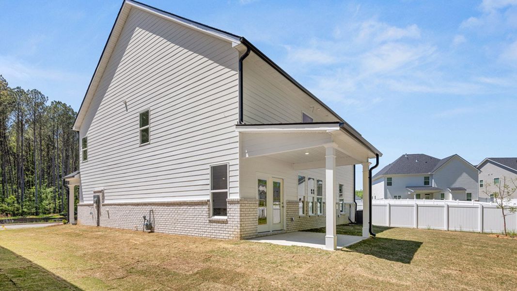 Exterior details and patio area of a home in Wildwood, Covington (Image 18). Exterior details and patio area of a home in Wildwood, Covington (Image 18).