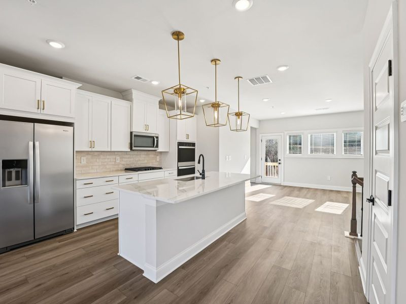 Furnished interior view inside a new home in Hemingway - Highland Series, Cumming (Image 6).