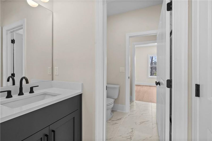 Furnished interior view inside a new home in Bellwyn, Johns Creek (Image 9).