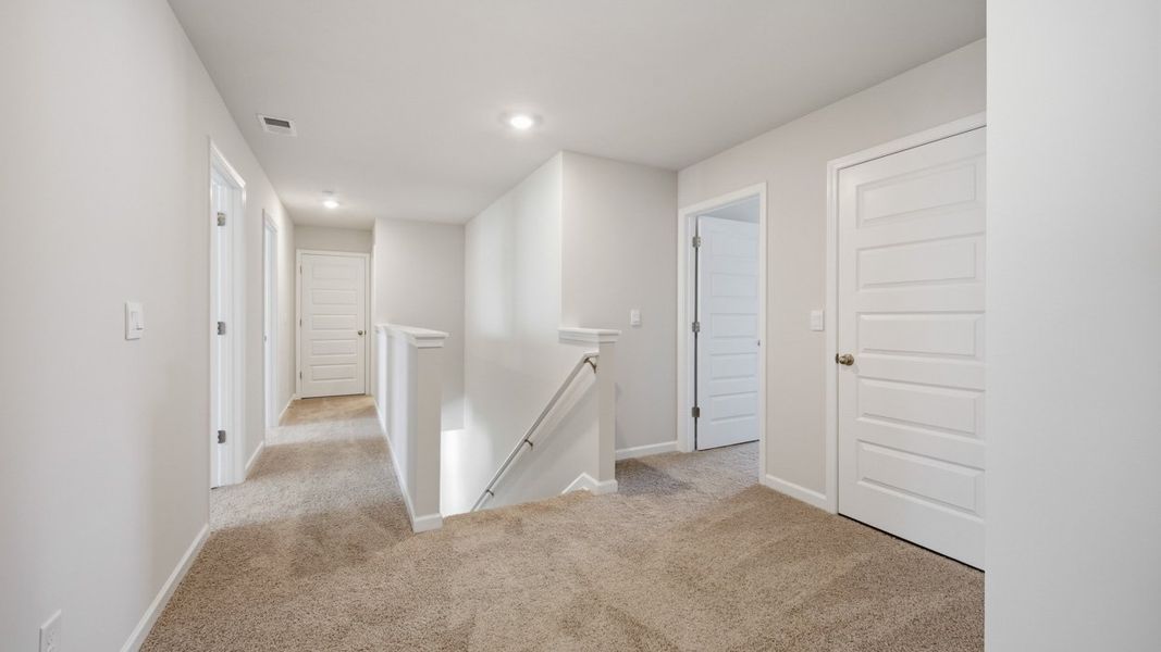 Spacious, unfurnished interior of a new home in The Reserve at Calcutta, Stockbridge (Image 24).