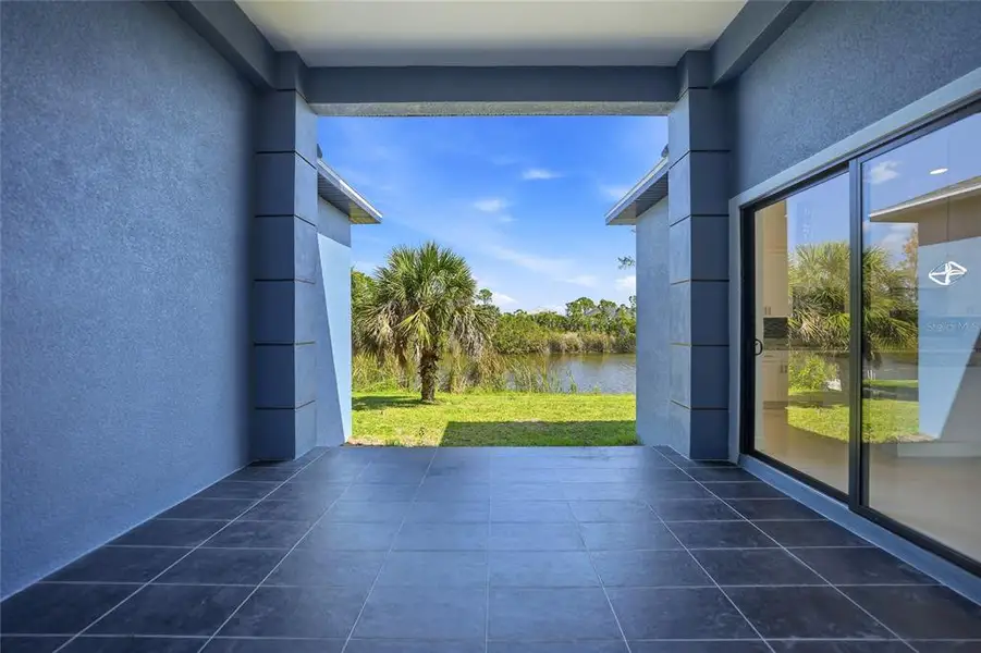 Exterior details and patio area of a home in , Port Charlotte (Image 27).