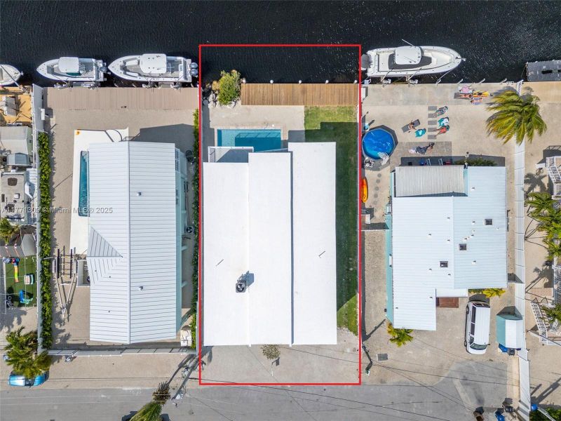 Front exterior of a new home in , Key Largo, FL, highlighting curb appeal (Image 2).