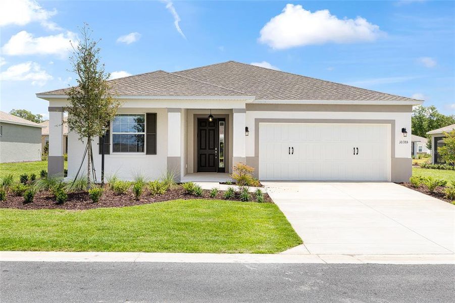 Front exterior of a new home in , Ocala, FL, highlighting curb appeal (Image 19). Front exterior of a new home in , Ocala, FL, highlighting curb appeal (Image 19).