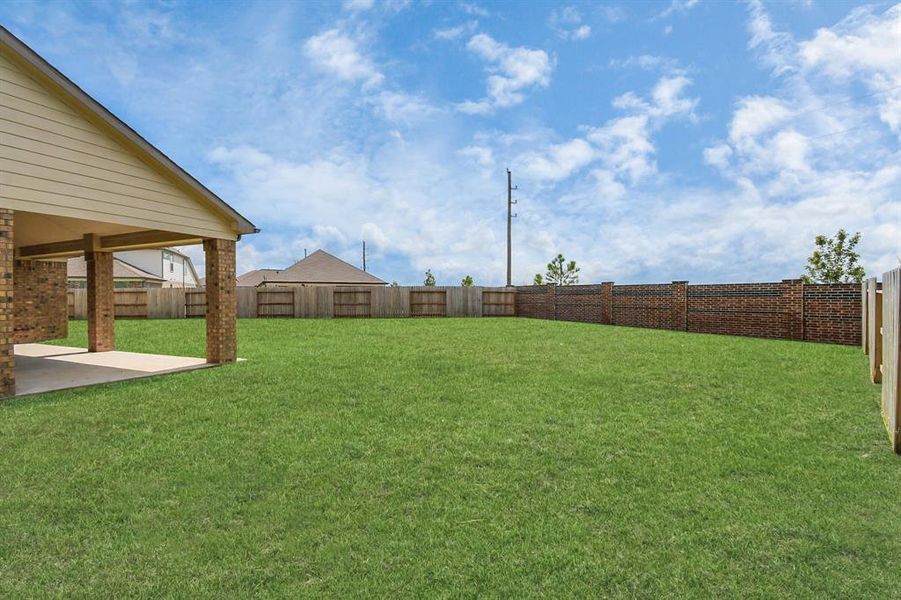 Backyard retreat, offering an abundance of space for kids to play and explore. The possibilities are endless in this outdoor haven, where the joy of open-air activities and family gatherings awaits.