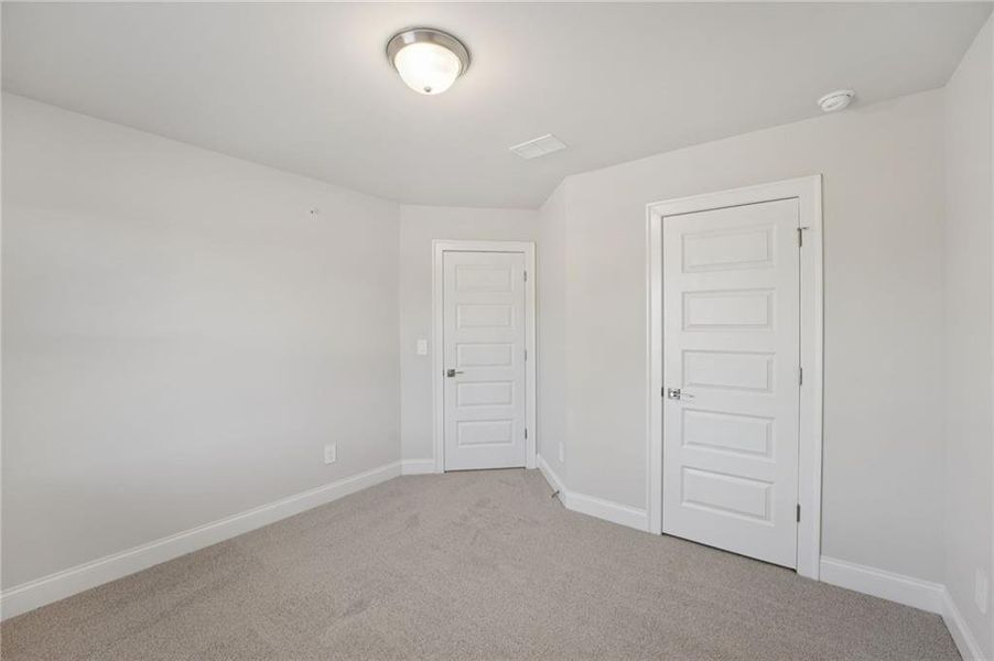 Spacious, unfurnished interior of a new home in Hemingway - Highland Series, Cumming (Image 24).