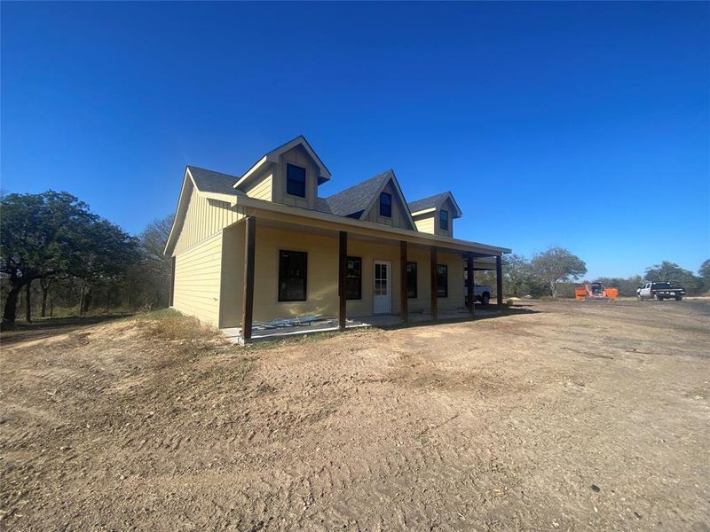 View of front of property featuring covered porch
