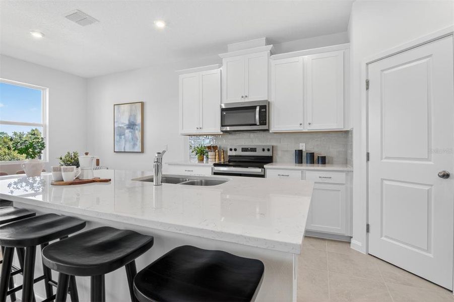 Furnished interior view inside a new home in Rainwood, Groveland (Image 6).
