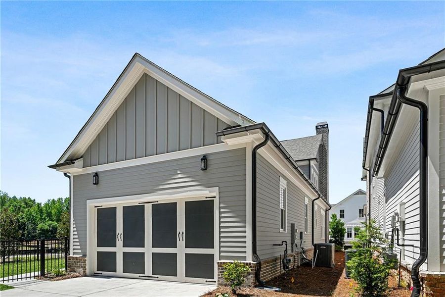 Front exterior of a new home in , Milton, GA, highlighting curb appeal (Image 25).