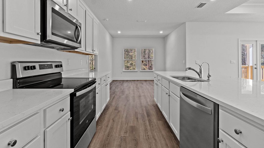 Representative furnished interior of a home built from the Camden by D.R. Horton in Owl's Head Farms, Freeport (Image 5).
