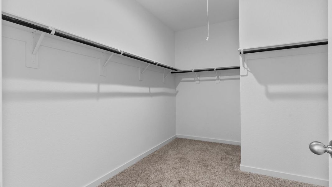 Representative unfurnished interior of a home built from the Mitchell by D.R. Horton in Watermark, Alvin (Image 21).