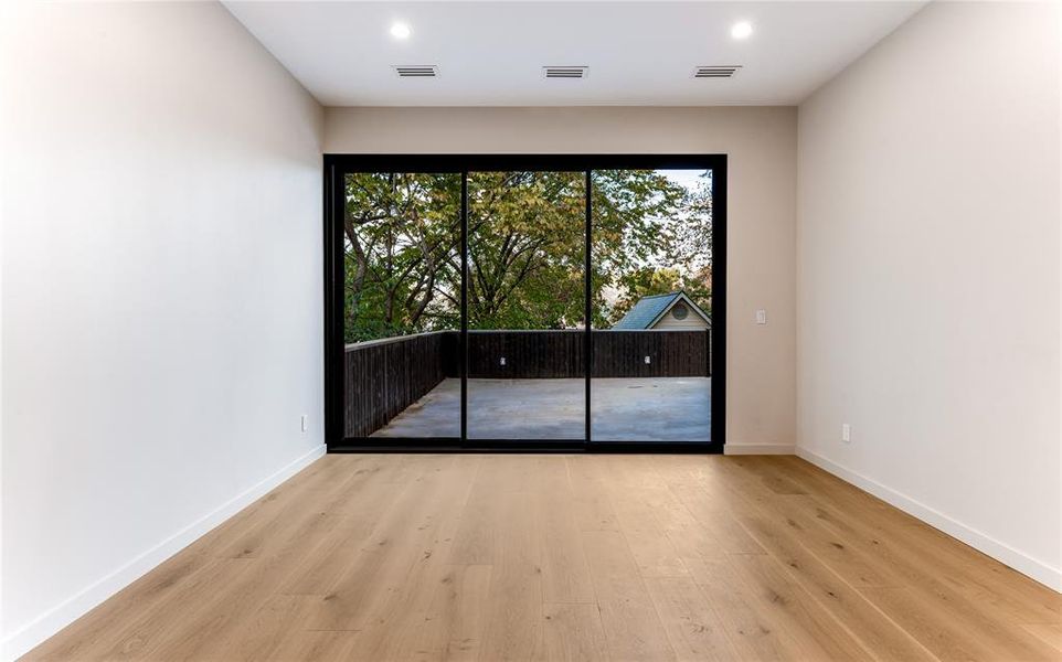 Rear facing game room with spacious terrace.