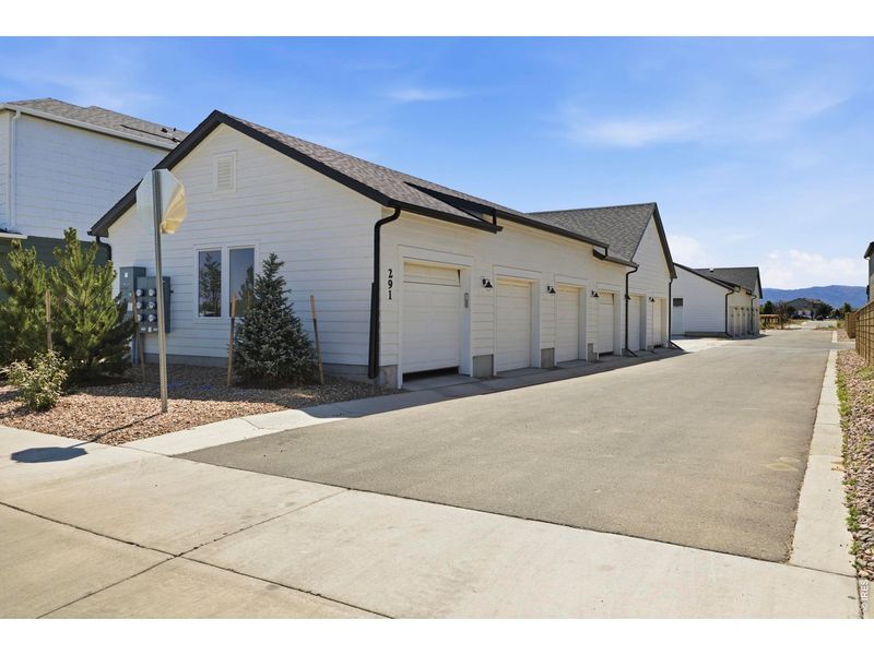 Front exterior of a new home in Bloom, Fort Collins, CO, highlighting curb appeal (Image 21).