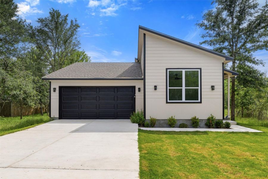 Front exterior of a new home in , Bastrop, TX, highlighting curb appeal (Image 25). Front exterior of a new home in , Bastrop, TX, highlighting curb appeal (Image 25).