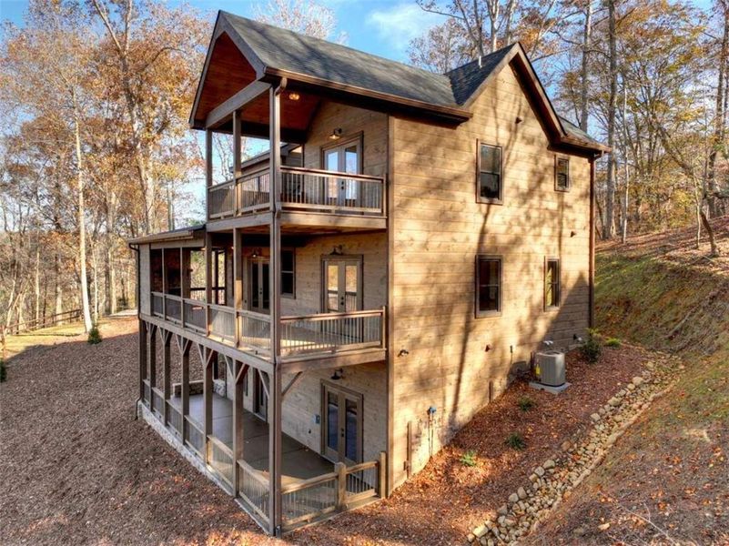 Exterior details and patio area of a home in , Ellijay (Image 22).