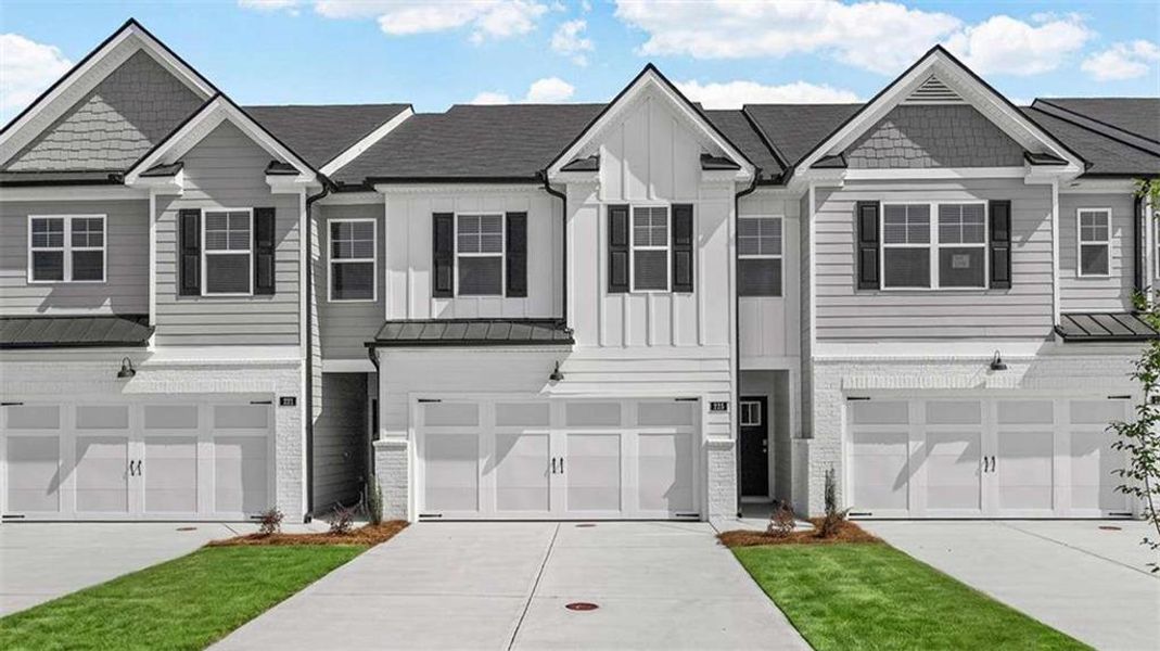 Front exterior of a new home in Echo Glen, Stockbridge, GA, highlighting curb appeal (Image 1). Front exterior of a new home in Echo Glen, Stockbridge, GA, highlighting curb appeal (Image 1).