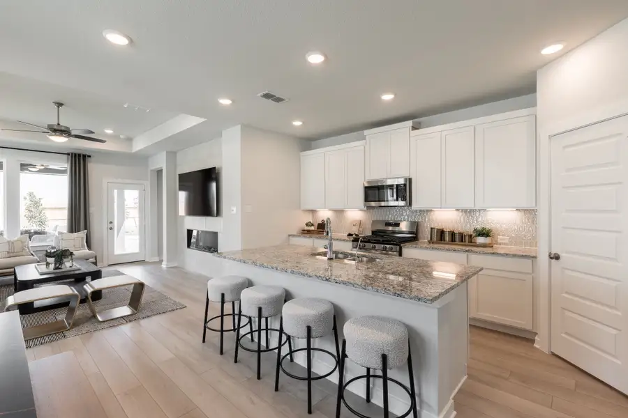 Furnished interior view inside a new home in Mason Woods, Cypress (Image 4).