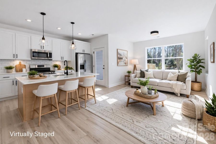 Open main living area with lots of sunlight! Virtually Staged Photo