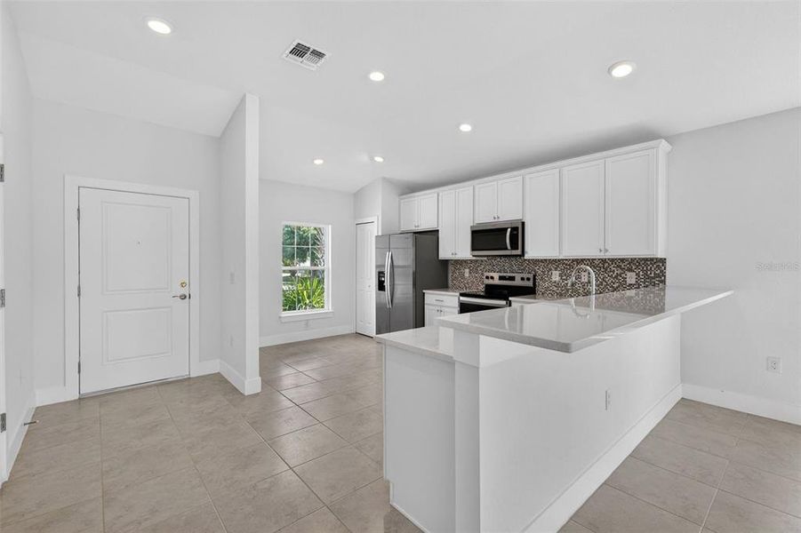 Furnished interior view inside a new home in , Port Charlotte (Image 7).