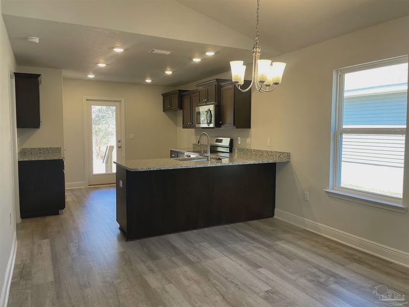 Furnished interior view inside a new home in Turtle Creek, Cantonment (Image 4).