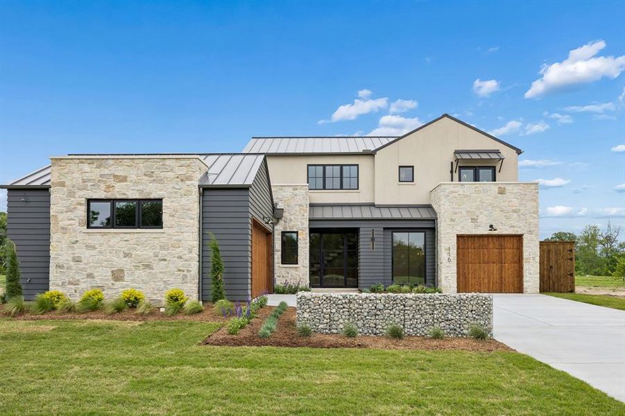Front exterior of a new home in , Coppell, TX, highlighting curb appeal (Image 22). Front exterior of a new home in , Coppell, TX, highlighting curb appeal (Image 22).