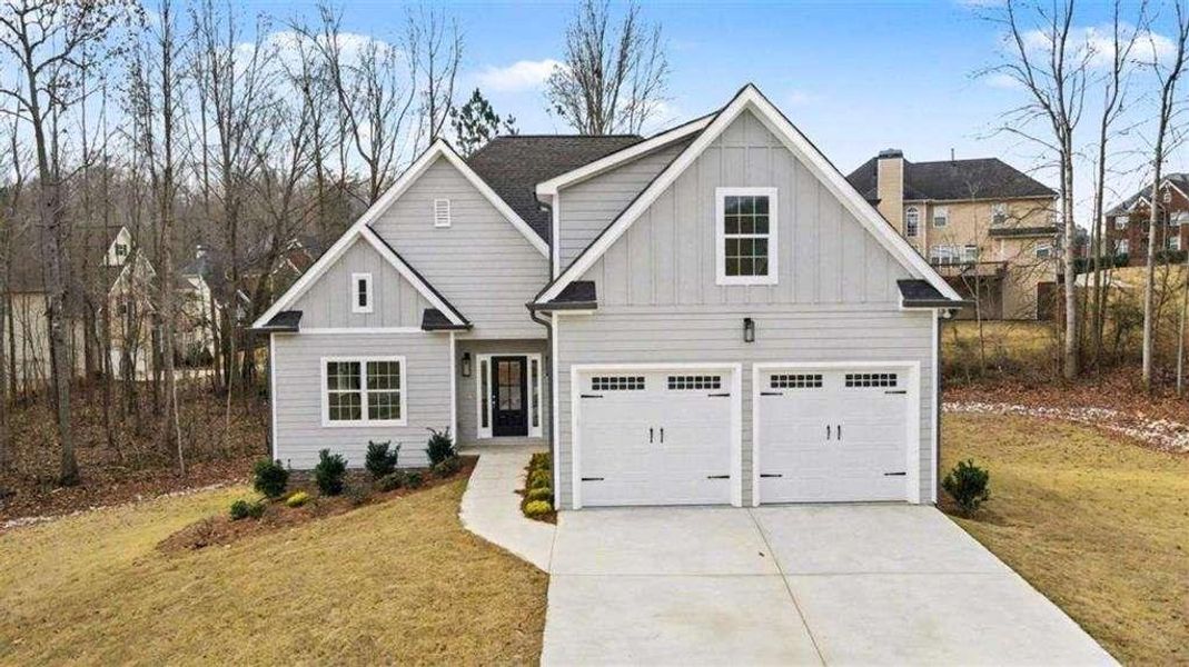 Front exterior of a new home in , Douglasville, GA, highlighting curb appeal (Image 17). Front exterior of a new home in , Douglasville, GA, highlighting curb appeal (Image 17).