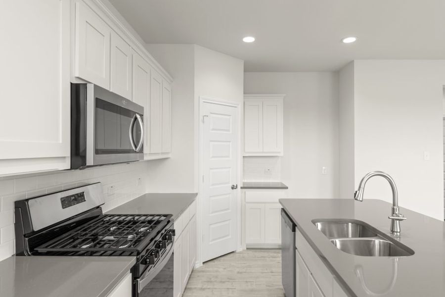 Representative exterior photo of a completed home built from the Cottonwood by Impression Homes in Northspur, Terrell, TX (Image 8).