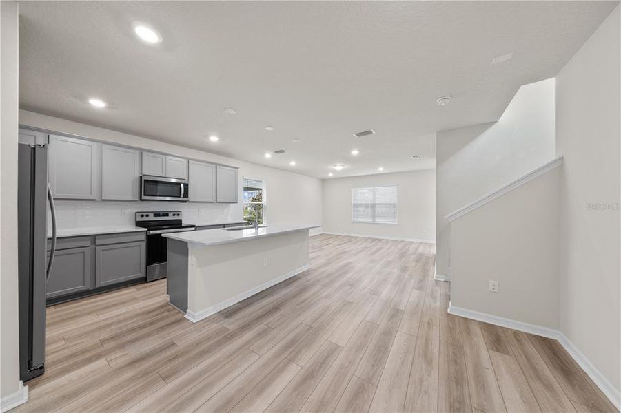 Furnished interior view inside a new home in EverBe, Orlando (Image 6).