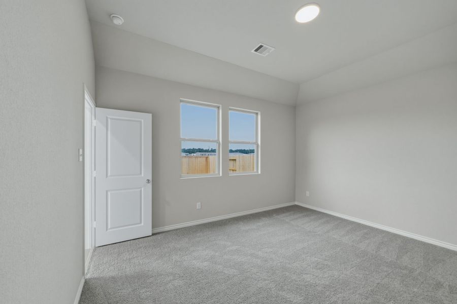 Primary Bedroom in the Cedar home plan by Trophy Signature Homes – REPRESENTATIVE PHOTO Primary Bedroom in the Cedar home plan by Trophy Signature Homes – REPRESENTATIVE PHOTO